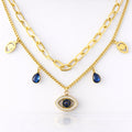 Gold Layered Necklace with Evil Eye & Sapphire Blue Charms